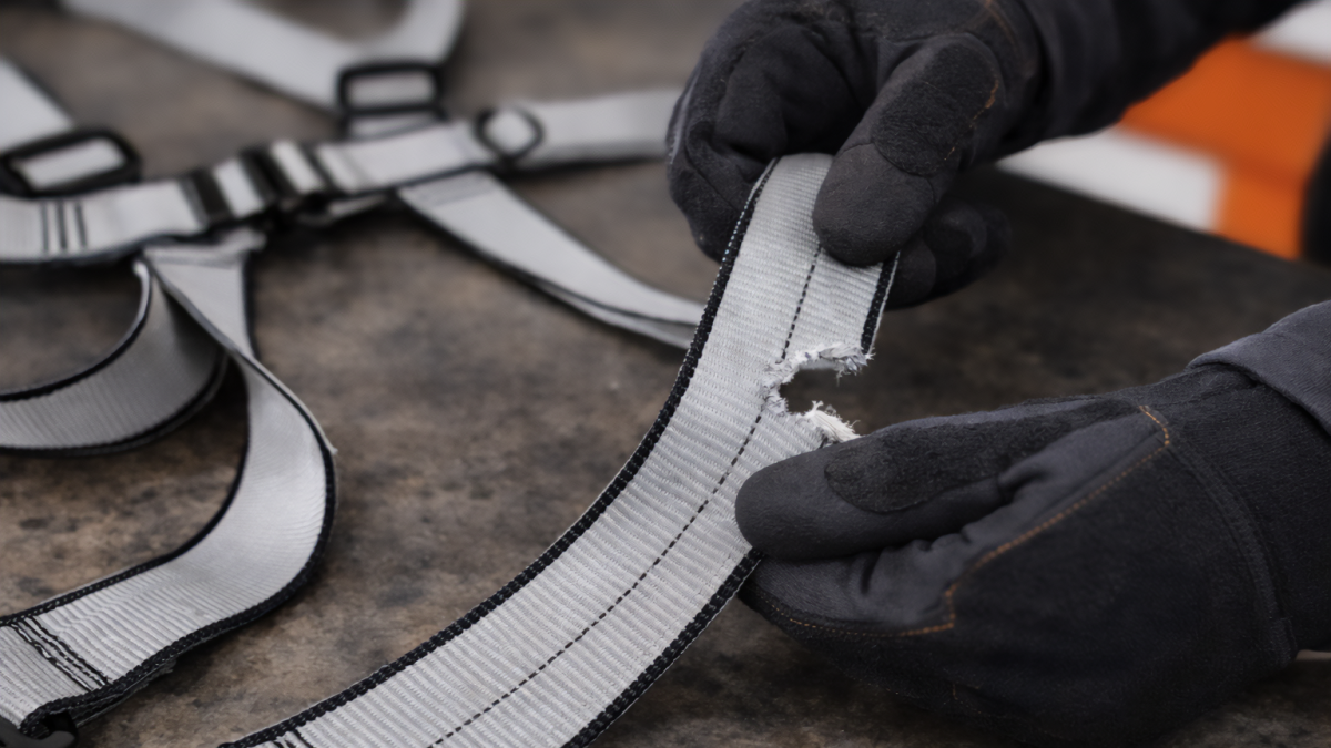 Close-up of damaged harness webbing edge